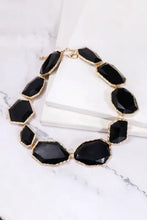 Black and gold zinc alloy frame resin necklace with multicolored faceted stones