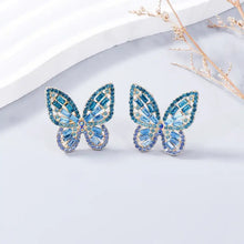 Alloy inlaid rhinestone butterfly earrings with blue teal gemstones