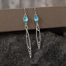Alloy rhinestone asymmetric earrings with turquoise oval gemstones