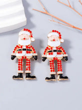 Alloy rhinestone Santa earrings with red gems and dangle design