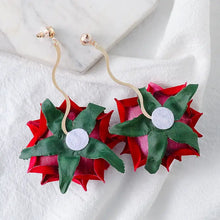 Red and green poinsettia alloy rose dangle earrings with gold wavy hooks