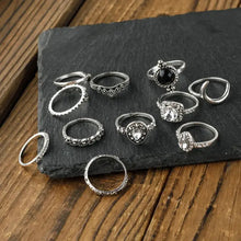 Alloy synthetic crystal 11-piece ring set with silver-toned designs and gemstones