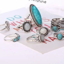 Alloy turquoise and opal ring set in silver-toned designs with stone accents