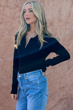 Black ribbed knit bodysuit with v-neckline and johnny collar long sleeve for a stylish full size fit