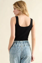 Black ribbed square neck bodysuit showing the back side with a square back neckline in ribbed knit fabric
