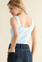 Light blue ribbed square neck bodysuit showing the back with a square back neckline and knit fabric texture