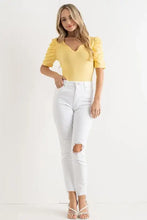 Yellow shirring puff sleeve bodysuit with v-neckline and fitted silhouette in the and the why collection