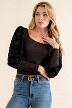 Black textured puff sleeve bodysuit with ribbed body and long ruffled sleeves from And The Why collection
