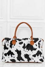 Animal print brushed weekender bag with brown leather handles