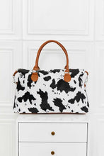 Animal print brushed weekender bag with brown leather handles