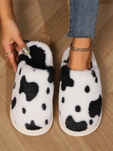 Black and white cow animal print faux fur slippers