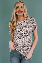 Animal print round neck tee with short sleeves and black spots