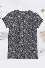 T-shirt donna con scollo rotondo e stampa animalier, tunica con tasche