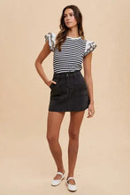 Annie Wear cargo denim mini skirt in black with front pockets and a high waistline denim mini skirt design