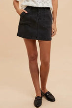 Annie Wear cargo denim mini skirt in black with a high waist and two front pockets denim mini skirt