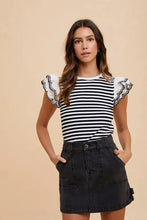 Black and white striped top with ruffled lace sleeves paired with annie wear cargo denim mini skirt in denim fabric