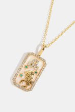 Gold Aquarius rhinestone constellation pendant necklace with lion design
