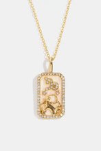 Gold Aquarius rhinestone constellation pendant necklace with horse design