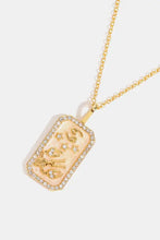 Gold Aquarius rhinestone constellation pendant on chain necklace