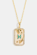Gold Aquarius rhinestone constellation pendant necklace with turquoise accents