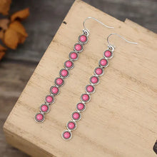 Pink beaded dangle earrings with artificial turquoise alloy bar design