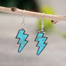Artificial turquoise lightning bolt dangle earrings in turquoise and silver-tone