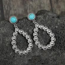 Silver-toned artificial turquoise teardrop earrings with concho hoops