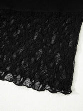 Black sheer floral lace fabric with intricate floral patterns and scalloped edge for long sleeve top panels