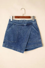 Blue asymmetrical denim skort with pockets