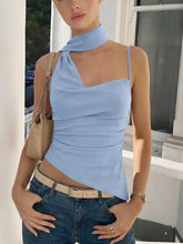 Light blue satin cami with asymmetrical neckline and ruching featuring a high neck and thin straps