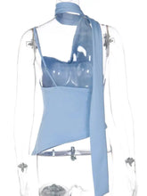 Light blue satin cami with asymmetrical neckline and ruched detailing in a sheer fabric top design