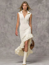 Cream-colored ribbed knit sleeveless dress with asymmetrical ruffle hem