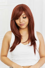 Woman with auburn layered wave synthetic wig with bangs, cap included