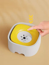 Yellow and white automatic circulating filtered pet water fountain with textured surface and central spout