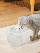 Fuente automática para mascotas con pico de plástico blanco translúcido y base circular