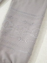 Gray knit scarf with intricate silver thread embroidery and geometric tribal patterns seen with aztec embroidered western v neck sweatshirt wash cold