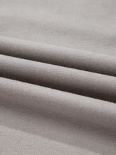 Soft light gray knit fabric with subtle ribbed pattern on aztec embroidered western v neck sweatshirt wash cold care