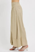 Beige wide leg pants risen shirring detail with pleated waistband and ruffled hem for stylish comfort