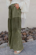 Olive green corduroy tiered wide leg pants with patchwork design and drawstring waist for casual wear