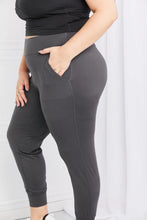 Dark gray leggings depot full size pocketed high waist pants made of sleek stretchy fabric with side pockets