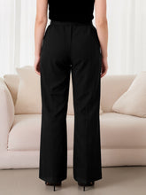 Plus size black wide-leg trousers with chain waist, tailored fit, subtle vertical pleats, machine wash care instructions
