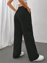Black high-waisted relaxed fit drawstring waist wide-leg pants with a comfortable, relaxed fit for casual wear