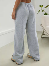 Light gray heathered casual drawstring high waist sweatpants with elastic waistband and wide relaxed fit