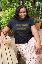 Simply Love Full Size COUNTDOWNS CHAMPAGNE RESOLUTIONS & CHEER Round Neck T-Shirt Black