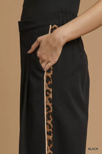 Umgee front pleated wide-leg black pants with bold leopard print contrast trim stripe down the side offer style