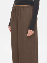 Brown wide leg drawstring pants with elastic waist designed for comfort and casual wear