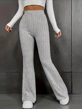 Plus size gray ribbed knit high waist flare pants featuring a comfortable fit with a flared leg design
