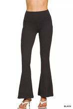 Black high-waisted flare pants made of smooth stretchy brushed dty microfiber fabric by Zenana