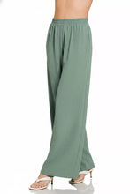 Mint green zenana woven airflow wide-leg trousers with textured lightweight fabric and elastic waistband