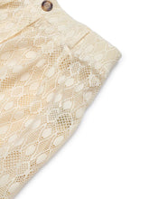 Cream-colored lace decorative button wide leg pants with intricate floral pattern and single metallic button waistband